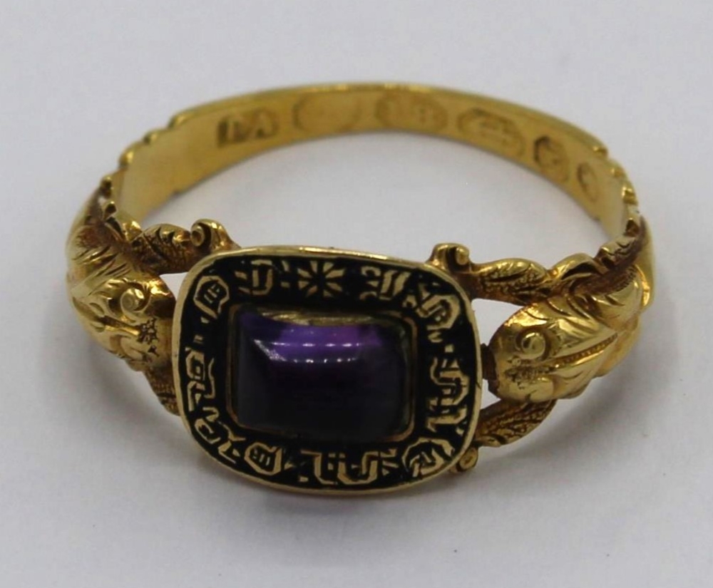 18ct yellow gold memorial ring set with cabochon purple stone on snake band, engraved inside "John