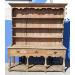 Pine open dresser, three tier panelled back with moulded cornice, base with