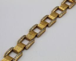 Cartier style 14ct yellow gold and diamond square link bracelet, set with one hundred and forty