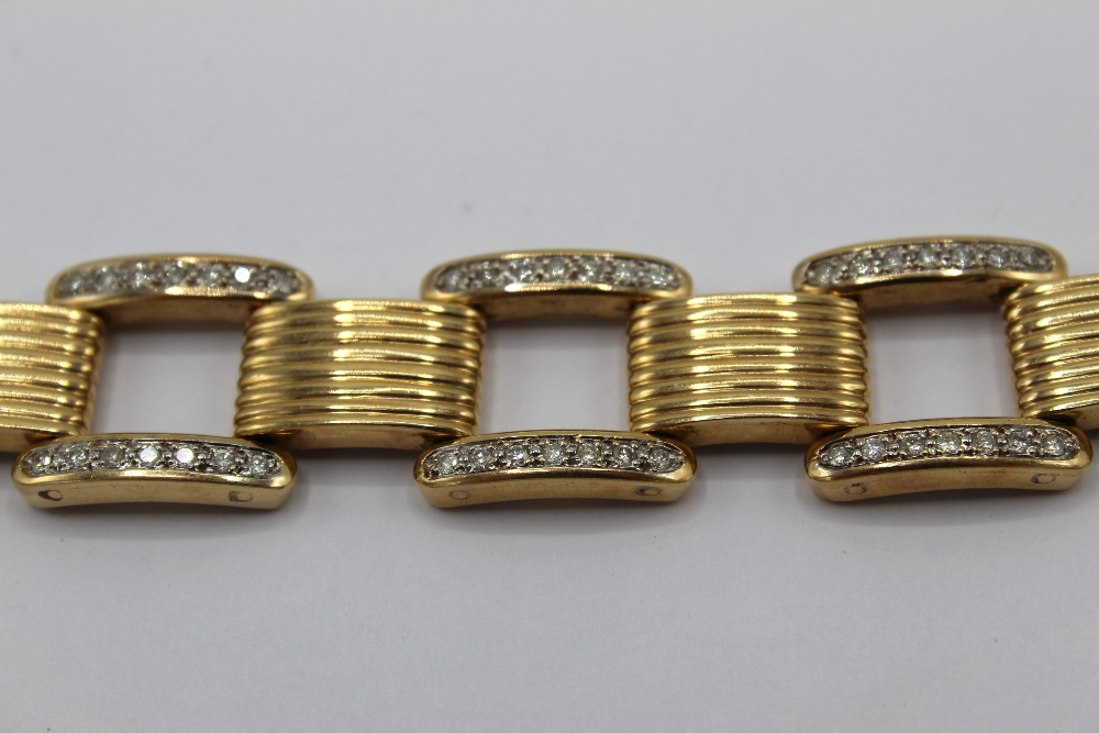 Cartier style 14ct yellow gold and diamond square link bracelet, set with one hundred and forty - Image 2 of 2