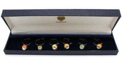 Collection of various Fabergé guilloche enamel wine charms, with arrow head decoration, in dark blue