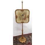 Victorian pole screen, the glazed square panel embroidered with a peacock and a bouquet of