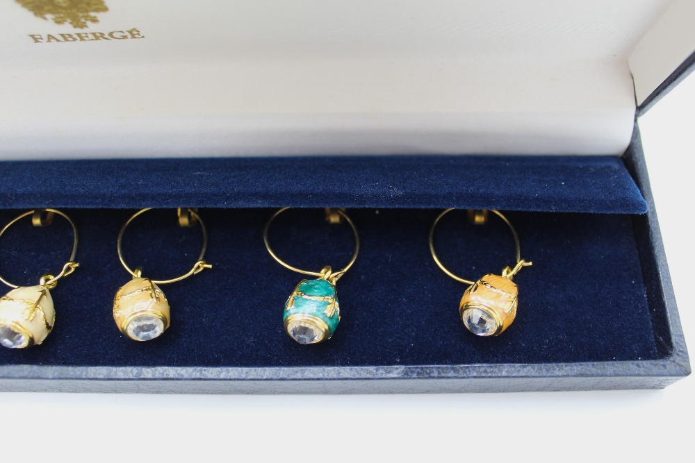 Collection of various Fabergé guilloche enamel wine charms, with arrow head decoration, in dark blue - Image 2 of 4