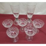 Pair of large wine glasses, the tapering bowls etched with fruiting vine, single knop stem