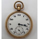 N B Swiss 9ct gold open faced keyless pocket watch, white enamel Arabic dial with rail track minutes
