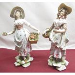 Pair of C20th Dresden porcelain models of female flower and produce sellers, both with baskets in