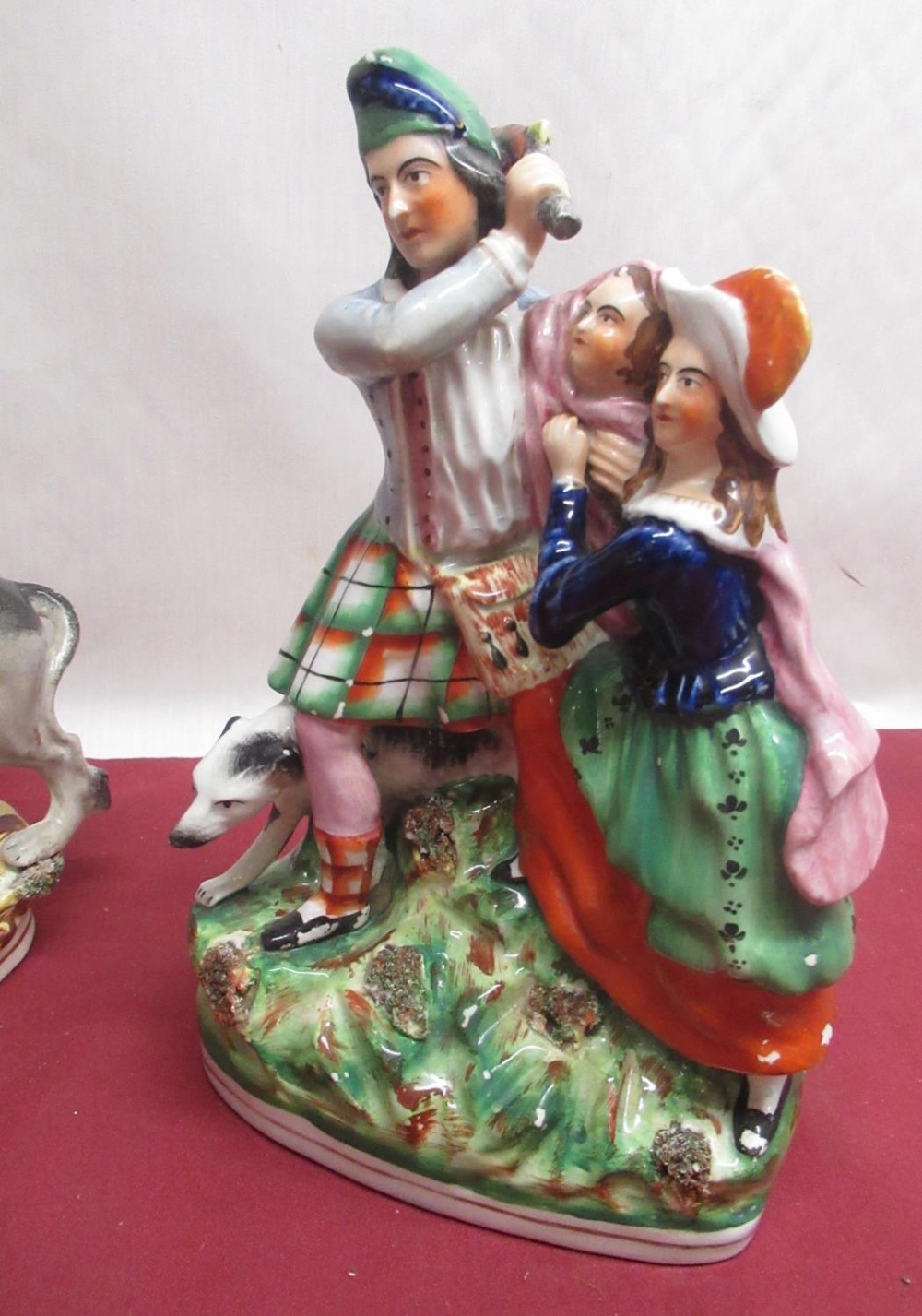 Two C19th Staffordshire figures, 'Samson and the Lion' H29cm, and a Highlander with family and - Image 2 of 3