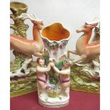 Pair of Staffordshire leaping Hound and Deer spill vases, H29 cm and a similar Adam and Eve spill