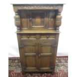 Small Titchmarsh & Goodwin carved oak court cupboard or Buffet, with arched door and long drawer