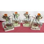 Two pairs of Victorian Staffordshire Zebra spill holders, (A/F) H18.5cm (4)