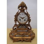 Late C19th French ormolu mounted mantel clock, with flower, urn and birds nest cresting, drum