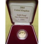 Royal Mint 2004 Gold Proof One Pound Coin, encapsulated, cased and boxed with cert. No.0103