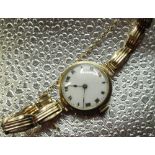 Early C20th ladies Swiss 9ct gold cocktail wristwatch, white enamel Roman dial with dot minute