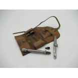 Late C19th percussion cap steel nipple key with screwdriver and gunpowder pick in brown leather case