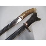 Two converted hunting type daggers, one with 13" Japanese short sword blade, brass mounts and antler
