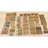 A wad of world bank notes to include early C20th Dutch, German and Belgian, Japanese Government