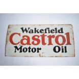 An enamelled steel plate Wakefield Castrol Motor Oil advertising sign. L90.7x43.2cm