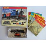 A boxed Hornby R1121 "Devon Flyer" OO guage train set with accessories, track, track mat etc. Also a