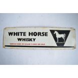 An enamelled steel plate White Horse Whiskey advertising sign. W61xH17.7cm