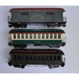 3 G gauge Bachmann twin bogie passenger coaches, no boxes. One has been re purposed as a Northeast