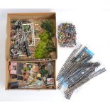 A collection of OO gauge trackside and diorama accessories including a large number of figures,