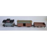 3 G-gauge railway wagons, 1 by Bachmann, 2 by Aristo including a track cleaning wagon. Both brown