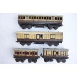 4 pre-war O gauge Bing and Carette railway coaches.