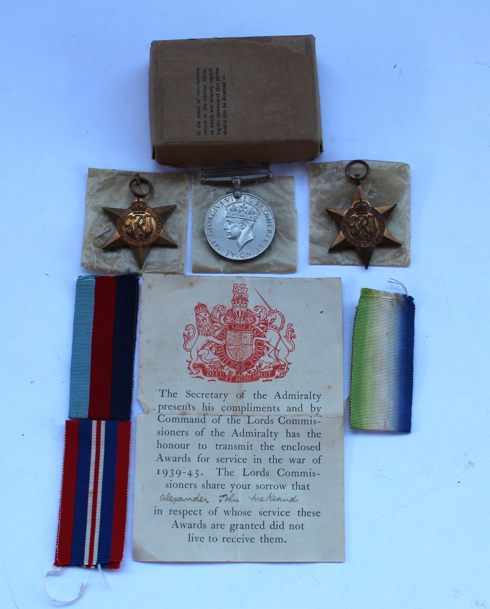 Set of three WWII medals including British War Medal 1939-45, 1939-45 Star and the Atlantic Star (