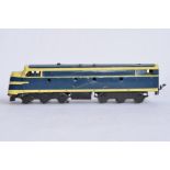 A vintage O gauge electric American style diesel locomotive, possibly repainted.