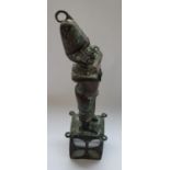 Large Benin bronze figure playing ceremonial pipe