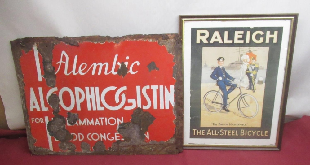 Framed Raleigh All-Steel bicycle advertisement and a vintage enamel sign "Alembic Alcophlogistin for