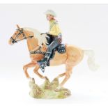 Beswick model of cowboy on galloping Palomino horse, model no. 1377