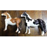 Two Beswick Pinto ponies, first versions, one piebald colourway, the other skewbald colourway,