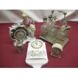 C20th six bottle cruet on stand, Ansley "Wild Tudor" quartz wall clock, two other clocks (qty)