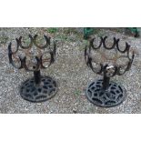 Pair of horse shoe garden urns approx. H19"