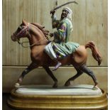 Beswick model of Bedouin Arab on galloping horse, mounted on wooden plinth in matte finish, model