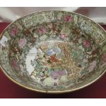 C20th Export ware Famille rose bowl, central panel decorated with mandarin household scene,