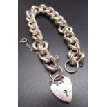 Sterling silver charm bracelet, with safety chain, hallmarked London 1974, RB Ltd, L20cm weight, 1.