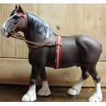 Beswick model of Clydesdale in show harness, in matte chocolate brown finish, model no. 2465