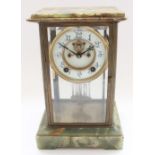 Ansonia early C20th American onyx and brass mantel clock, glazed full length bevel edged door