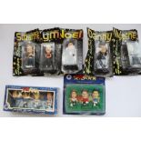 Collection of various football caricatures, various action figures including Sully from Monsters