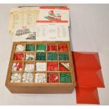 1950s Bayko construction set containing bricks windows, balustrades, end bricks, roof parts etc,