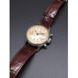 Late 1940's Leonidas chrome cased hand wound chronograph wristwatch. signed silvered dial with two