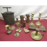 Metal fruit press, two brass candlesticks, brass chamberstick, Arnold and Sons copper Dariol mould