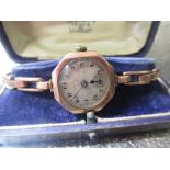 Early 20C ladies Wilsdorf & Davis Rolex 9ct gold cased hand wound wristwatch, silvered Arabic dial