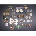 Collection of early C20th and later belt buckles and brooches including a cloisonné blue floral