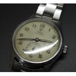 Tudor Oyster hand wound sports wristwatch, signed silvered dial with skeletonised Arabic numerals,
