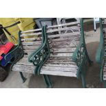Pair of garden seats with cast ends