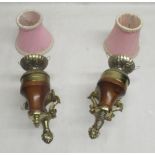 Pair of brass and wood wall lights with pink lamp shades