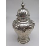 Continental silver tea caddy with English import marks for London, 1889, the urn shaped body with